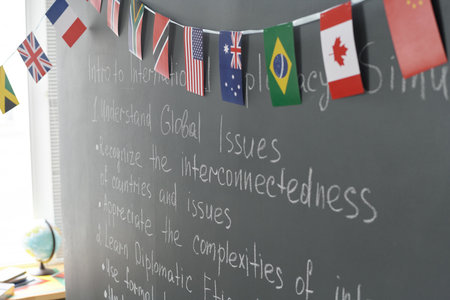 Close-up of blackboard with flags of different countries in the classroom at schoolの写真素材