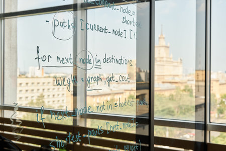 Background image of text and formulas on glass wall in modern school or college, no people, copy...