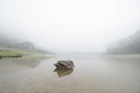 Foggy lakeの写真素材