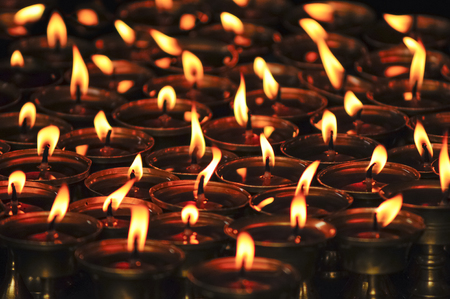 Candles in the buddhist templeの写真素材