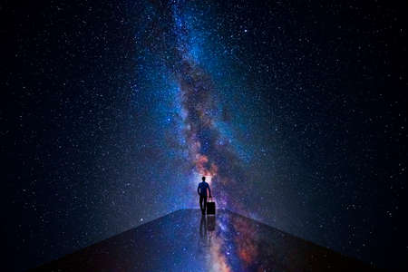 Man walking through the universeの写真素材