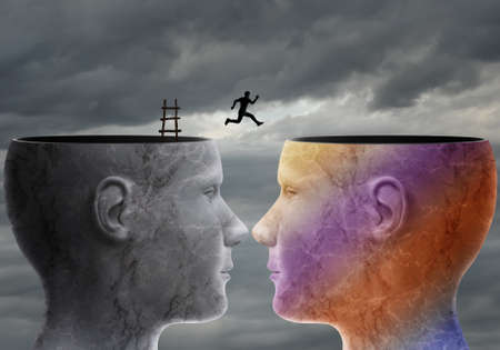 A man jumps from one head to anotherの写真素材
