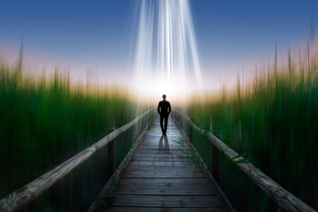 Man walking alone towards the light