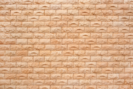 Orange beige rough bricks wall texture, background
の写真素材
