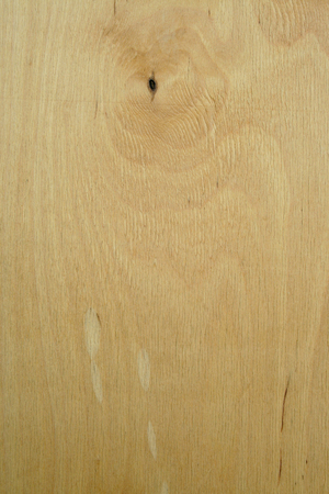 Old yellow plywood with knots texture. Rough texture backgroundの写真素材