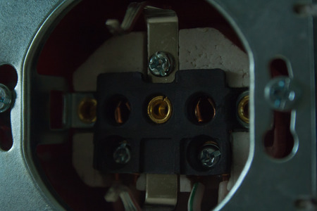 Disassembled power socket. Installation of the power socketの写真素材