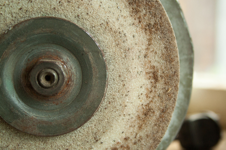 Old rusty Grindstone grinder in the workshopの写真素材