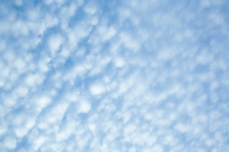 Sky with Spindrift clouds background. Textured clouds. Cloudscapeの写真素材