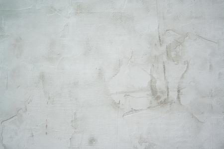 Uneven putty texture. Rough and grungy background of puttyの写真素材