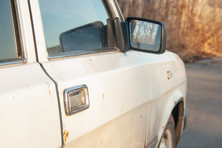 Close-up of white old retro car. Part of car vintageの写真素材