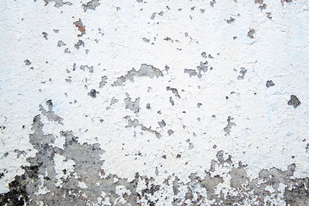 White chacked paint texture on cement wall. White backgroundの写真素材