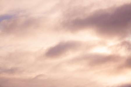 Cloudscape before rain background. Clouds pattern. Warm colorsの写真素材