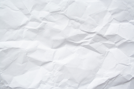 Crumpled white paper texture. Crushed paper abstract backgroundの写真素材