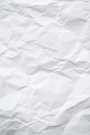 Crumpled white paper texture. Crushed paper abstract backgroundの写真素材