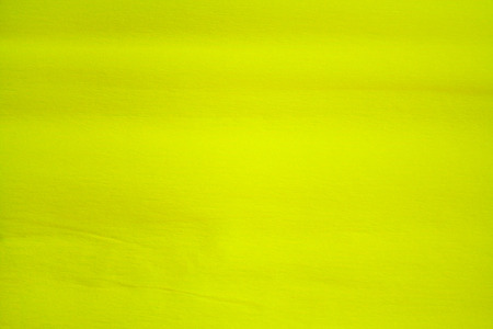 Corrugated yellow paper texture. Yellow abstract backgroundの写真素材