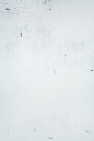 Old concrete wall. Crumbled plaster texture. Background cementの写真素材