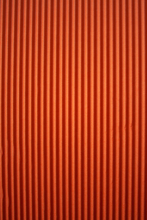 Red corrugated paper texture. Abstract red backgroundの写真素材