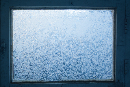 Ice crystals pattern on the window close up. Ice texture. Winter conceptの写真素材