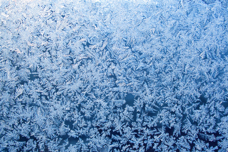 Ice crystals pattern on the window close up. Ice texture. Winter conceptの写真素材