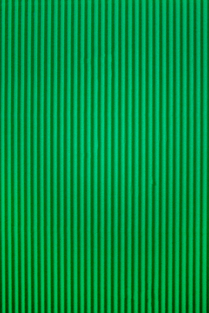 Green corrugated paper texture. Abstract green backgroundの写真素材