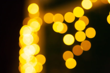 Yellow bokeh background. Christmas lights background. Bokeh pattern
