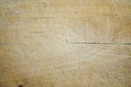 Old cutting domestic board texture. Used and aged cutting board close up.の写真素材