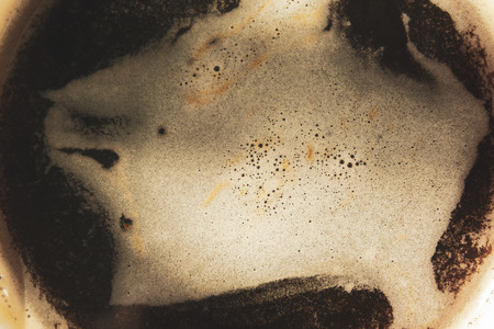 Close up of fresh hot black coffee foam. Early morning breakfast concept. forbidden drinks for people with high arterial pressureの写真素材