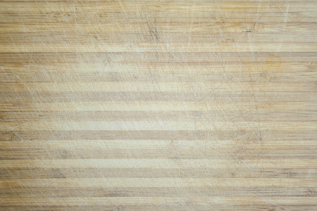 Old cutting domestic board texture. Used and aged cutting board close up.の写真素材