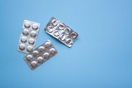Some medical blisters with pills top view. Medical concept of treatment diseases, sale of tablets, tablets in blister packs.の写真素材