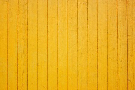 Wooden yellow wall texture. Grain wood background. Place for text. Texture for design. Bright woodの写真素材