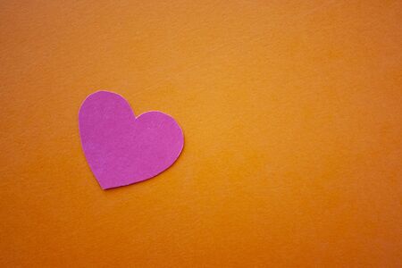 Love, valentines day, mothers day, women concept. Small paper heart shape on blue background top view copyspaceの写真素材