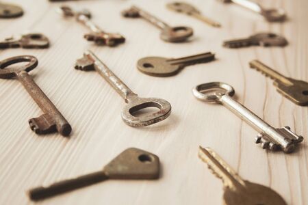 Side view of many old rusty keys background. Many keys Access, security, enter, choice, solutions of problems concept, symbolの写真素材
