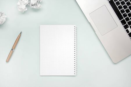 Work and creativity concept. Laptop, notepad, crumpled paper and pen top view flat lay photo with copyspace. Computer and paper work. Office aboveの写真素材