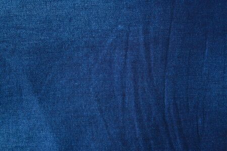 Textured striped blue jeans. Canvas denim texture. Blue denim that can be used as background. Blue jeans texture for any background.の写真素材