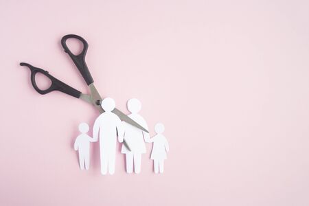 black scissor cutting family paper cut , dysfunctional family, bad children development, divorce parent broken family concept, mental healthの写真素材