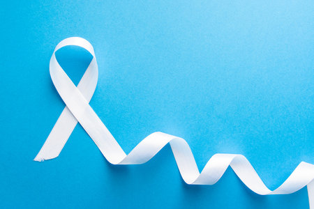 White ribbon as symbol of woman violence