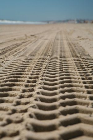 trace truck at a beach ground