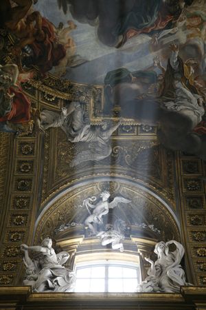 iluminated window with sculptures and paintingsの写真素材