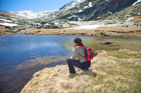 woman hiking at gredos mountains in avila spainの写真素材