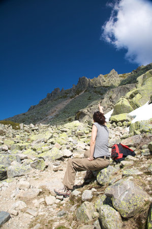 woman hiking at gredos mountains in avila spainの写真素材