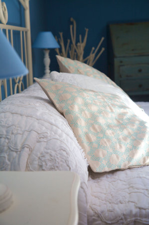 detail of pillow and bolster of a bedの写真素材