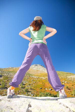 woman trekking at gredos mountains in avila spainの写真素材