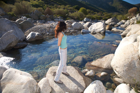 woman trekking at gredos mountains in avila spainの写真素材