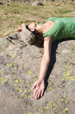 woman trekking at gredos mountains in avila spainの写真素材