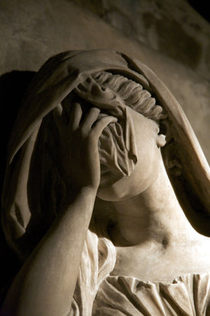 white marble classic statue of a woman cryingの写真素材