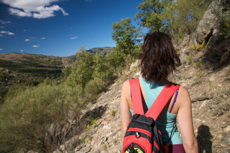 woman trekking at gredos mountains in avila spain