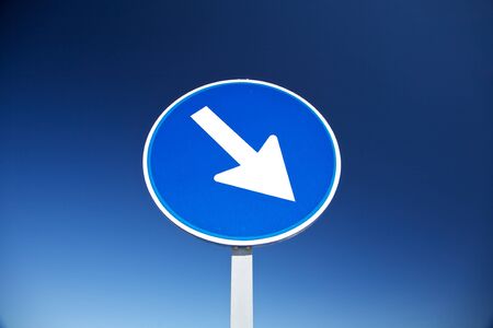 direction blue signal in a highway at Cadiz Spainの写真素材