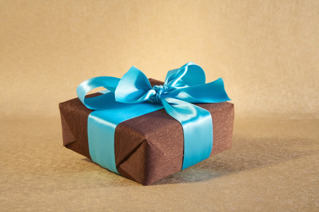 gift box with ribbon and bow at still life