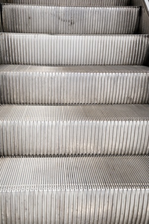 grey metal stairs and steps up directionの写真素材