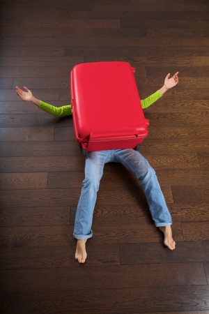 the big red suitcase killed a traveler womanの写真素材